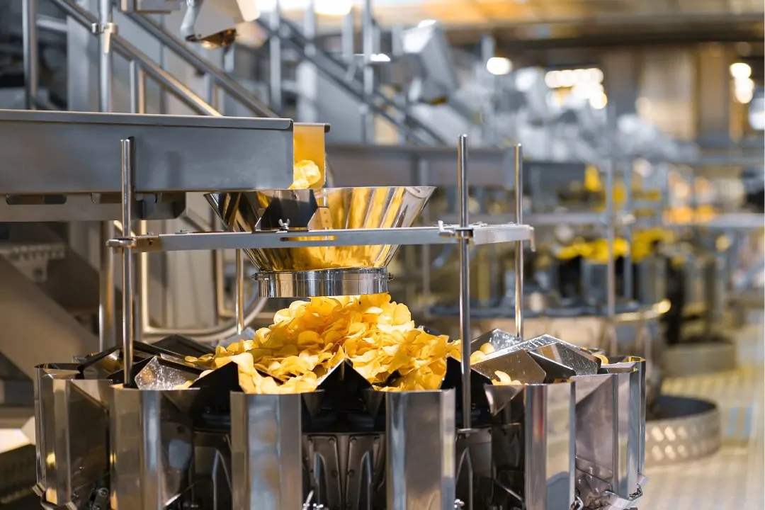 Potato,Chips,Production,Line,At,The,Plant.,Filling,Machines,For